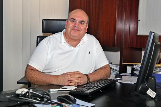 Dr. med. Christodoulos Phonias (55) fühlt sich arbeitsmäßig nicht überfordert und hofft, dass einer seiner Söhne, die beide Medizin studieren, später mal seine Hausarzt-Praxis in Wickede übernimmt. FOTO: ANDREAS DUNKER